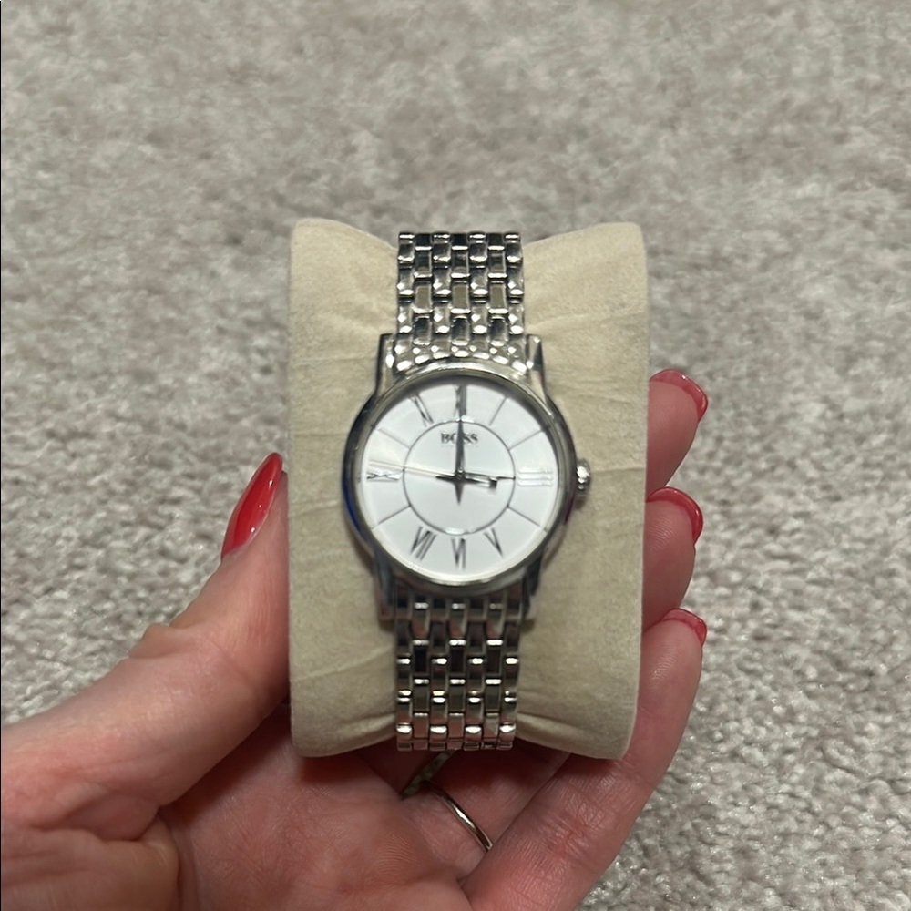 Hugo Boss Silver Watch. Stainless steel. White dial. Elegant styling.
